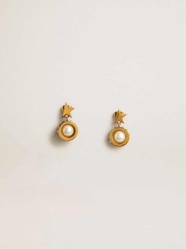 Earrings with gold star and pearl