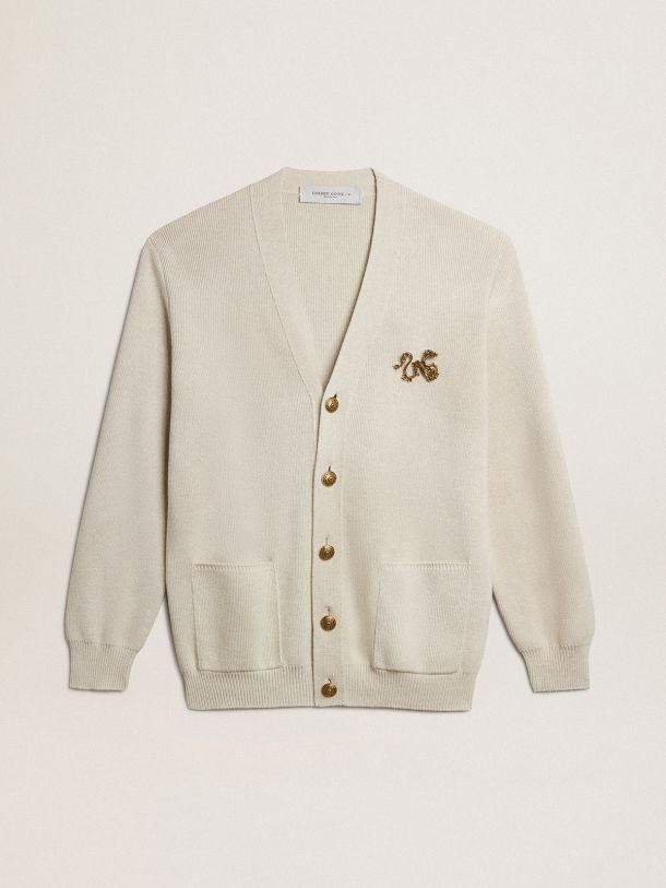 Cardigan in aged white cotton with gold button fastening