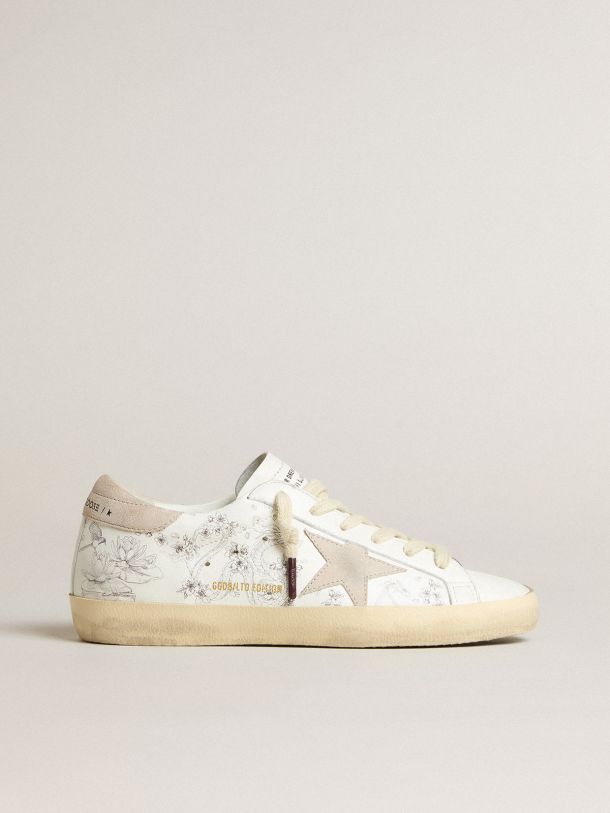 Women’s Super-Star LTD CNY in white leather with lettering on the upper