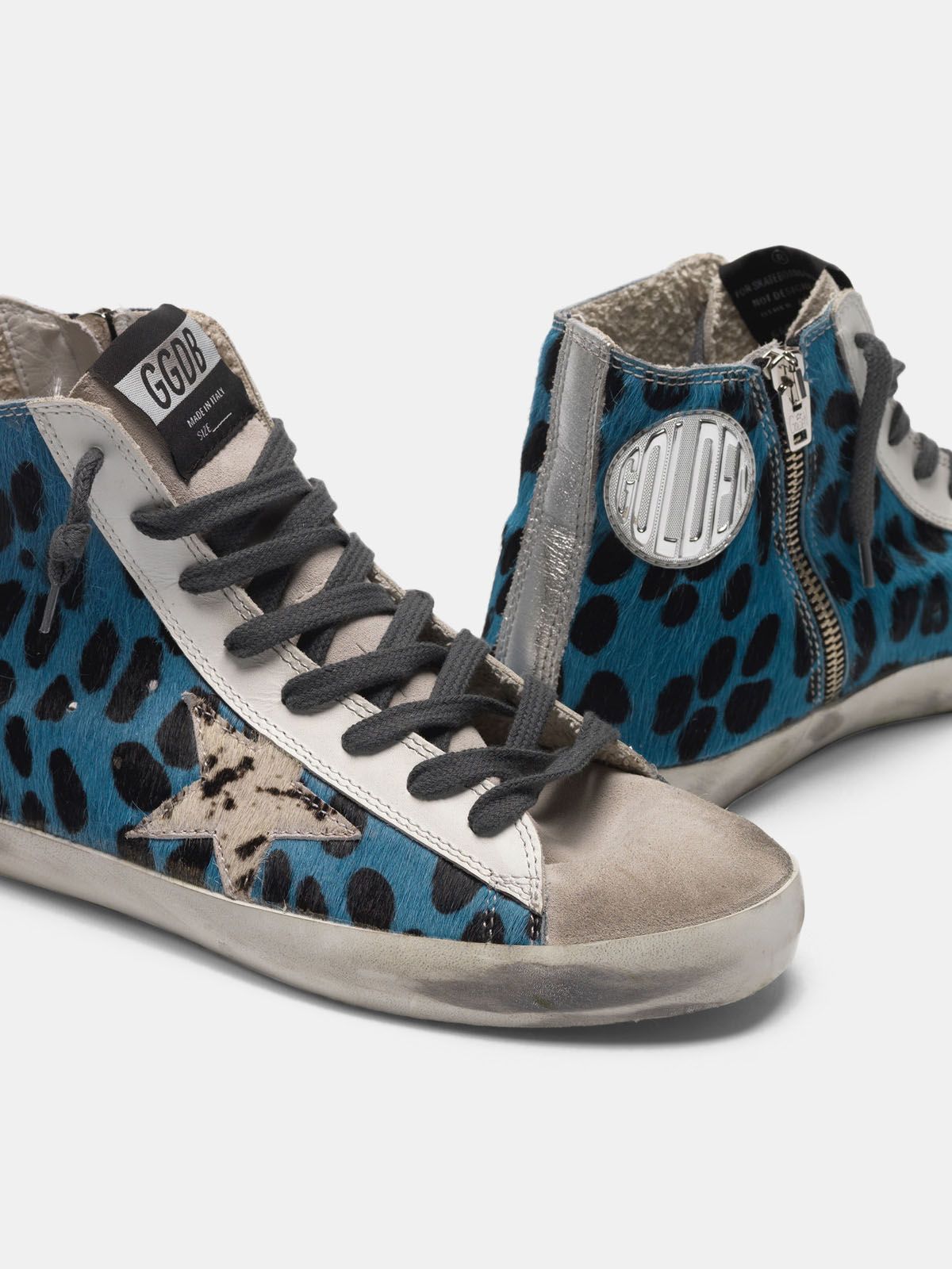 slide sneakers with leopard print pony skin inserts