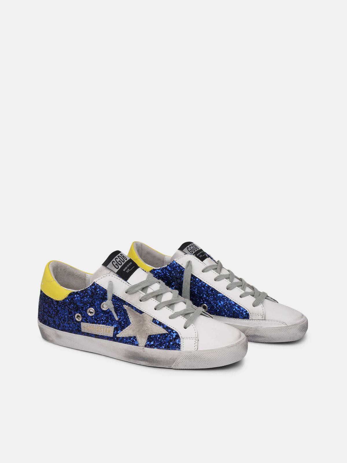 Super-Star sneakers with blue glitter and yellow heel tab | Golden Goose