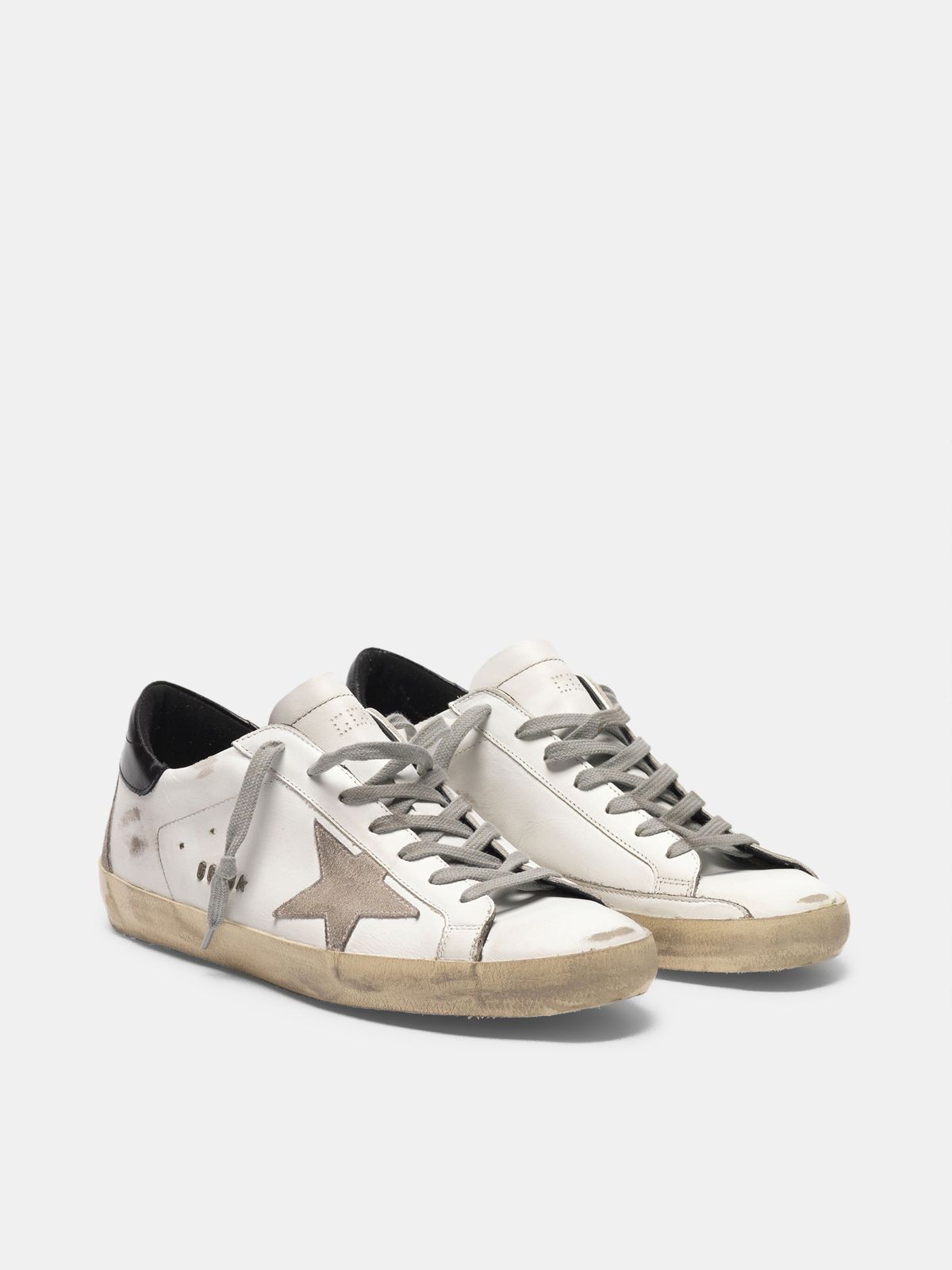 superstar sneakers with gold star and glittery black heel tab