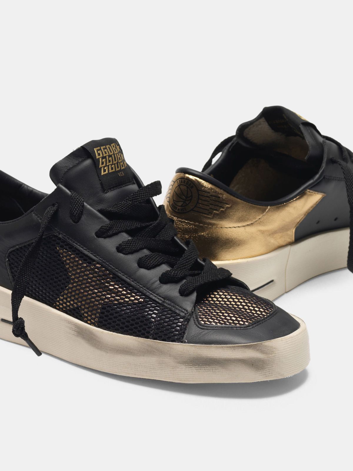 black and gold golden goose