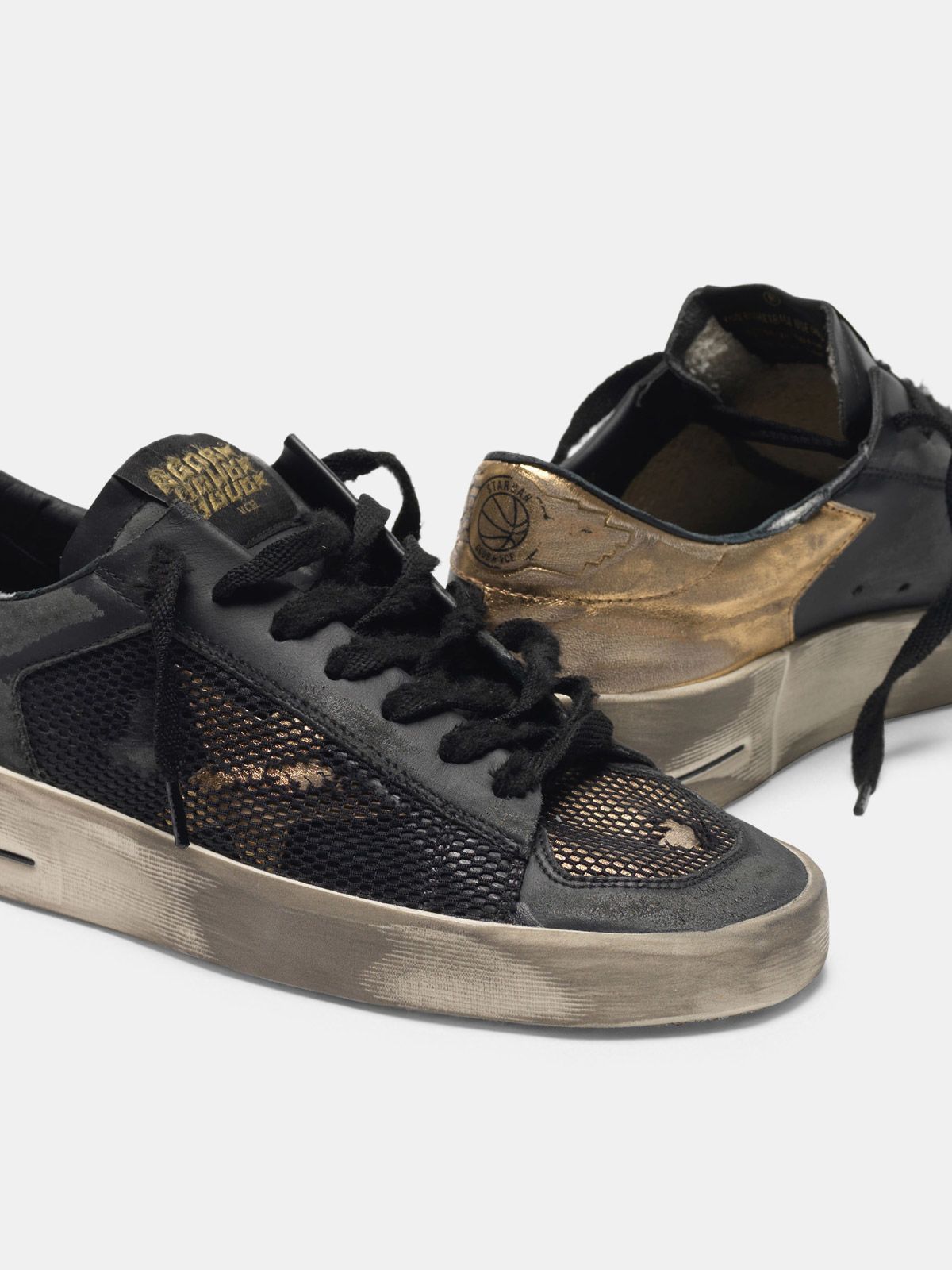 black and gold golden goose