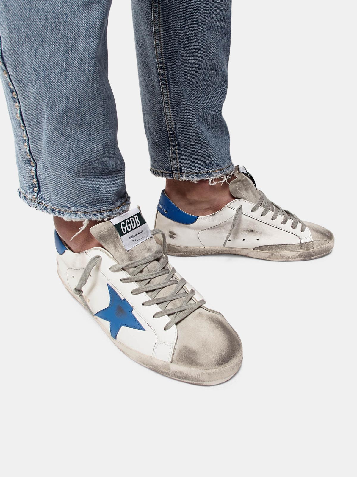 golden goose with blue star