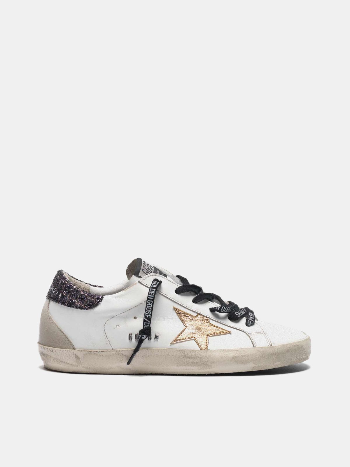 golden goose superstar sneakers with gold star and glitter black heel tab