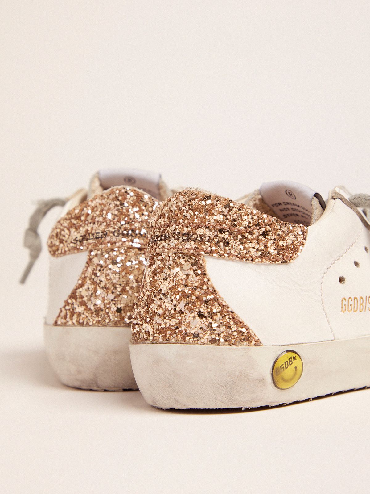Super Star Sneakers With Gold Glitter Heel Tab And Laminated Silver Star Golden Goose