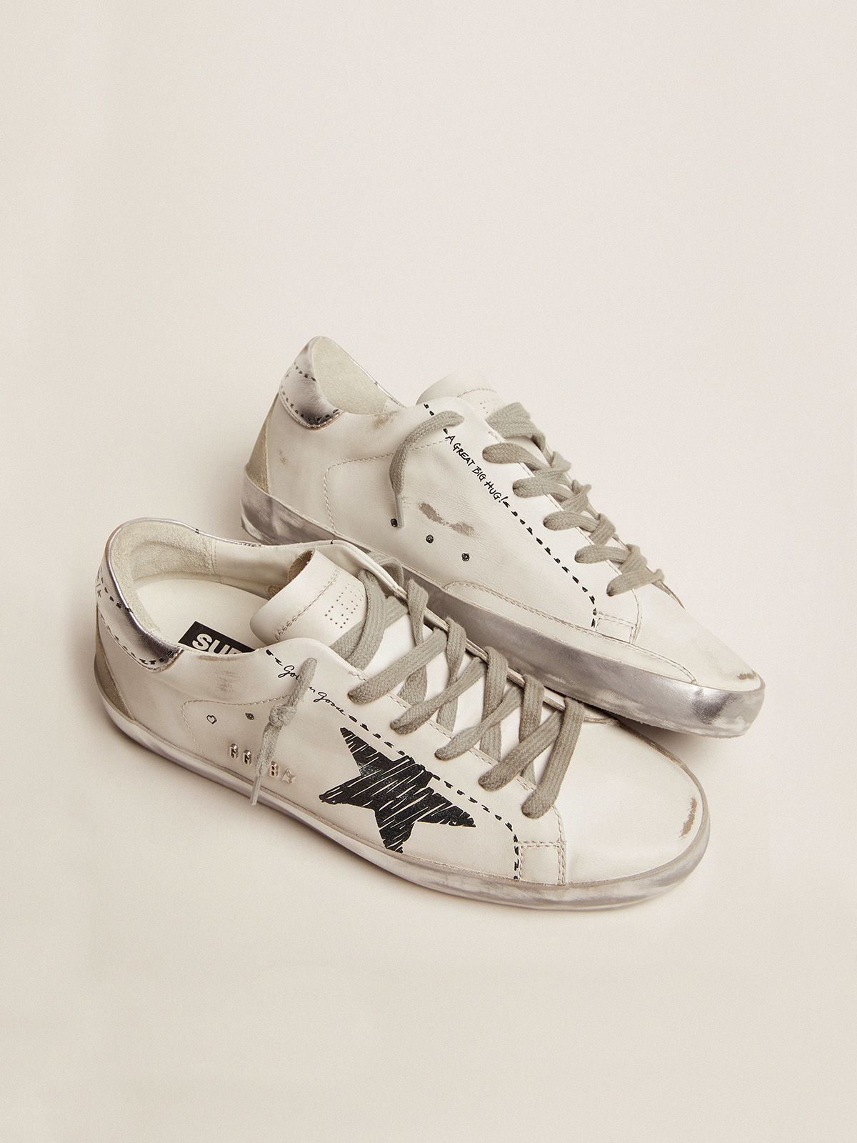 Super-Star sneakers with silver laminated leather heel tab and 