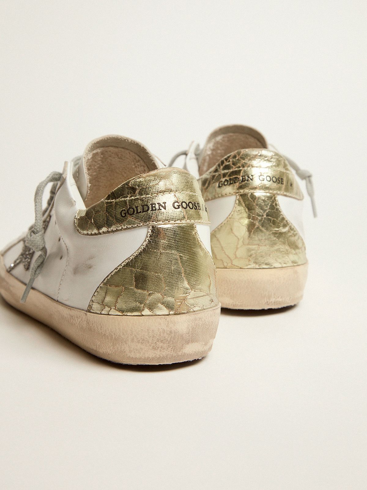 Super-Star sneakers with silver glitter star and glossy gold 