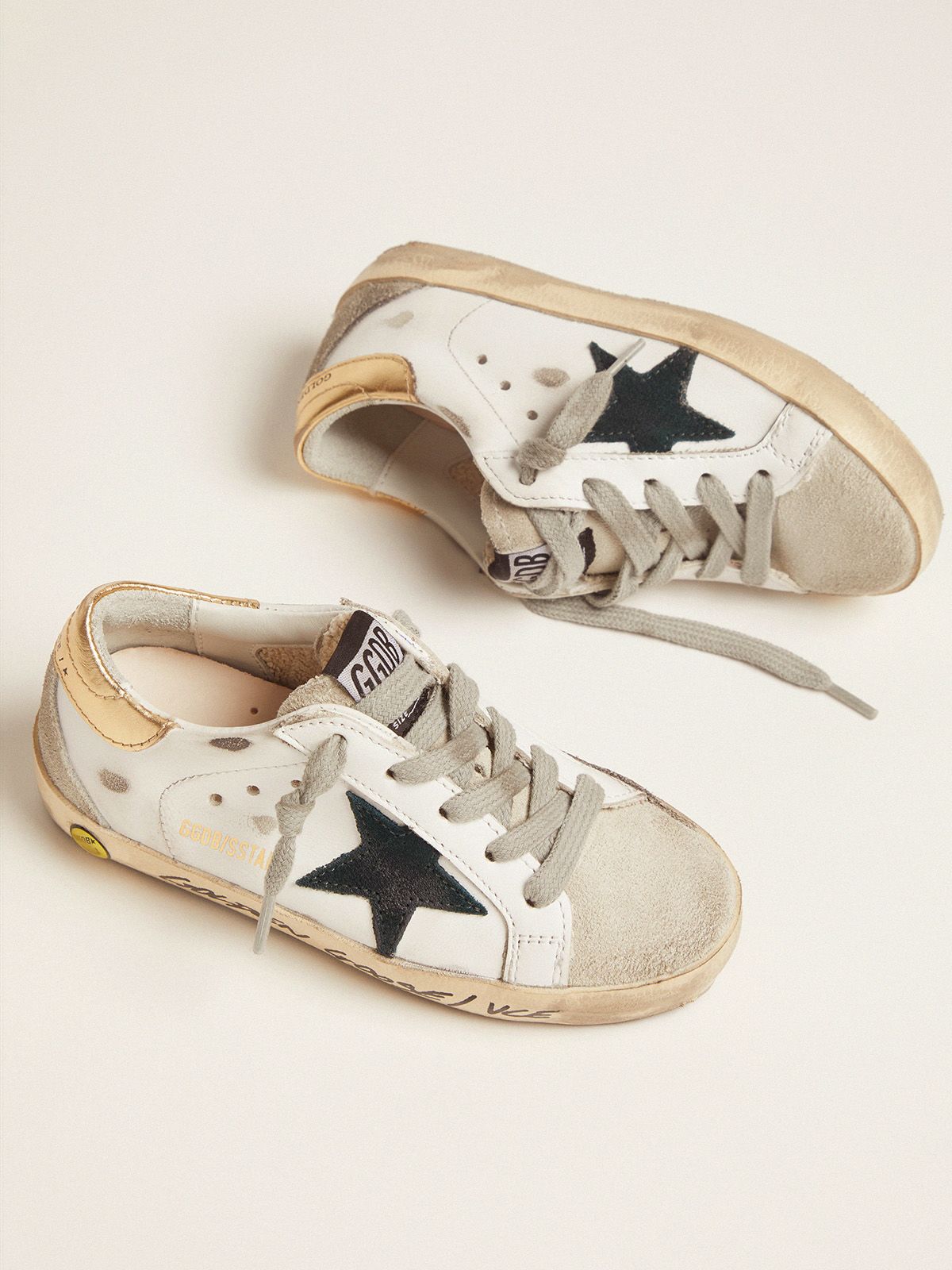 Super Star Sneakers With Gold Heel Tab And Handwritten Lettering Golden Goose