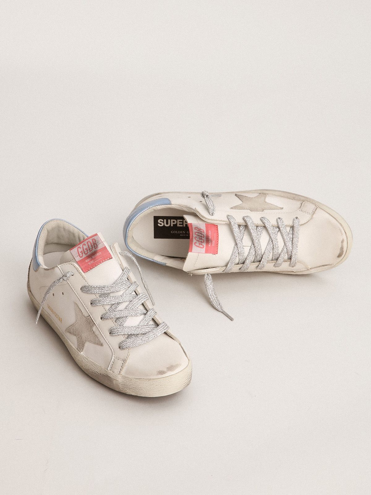 Super-Star sneakers with sky-blue laminated leather heel tab and ice-gray  suede star