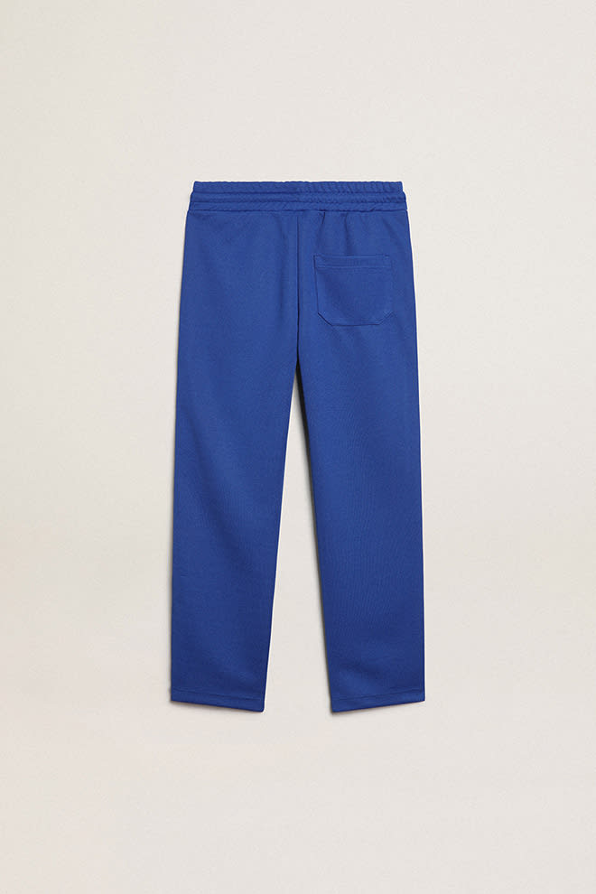 Bright blue joggers with white strip and contrasting bright blue