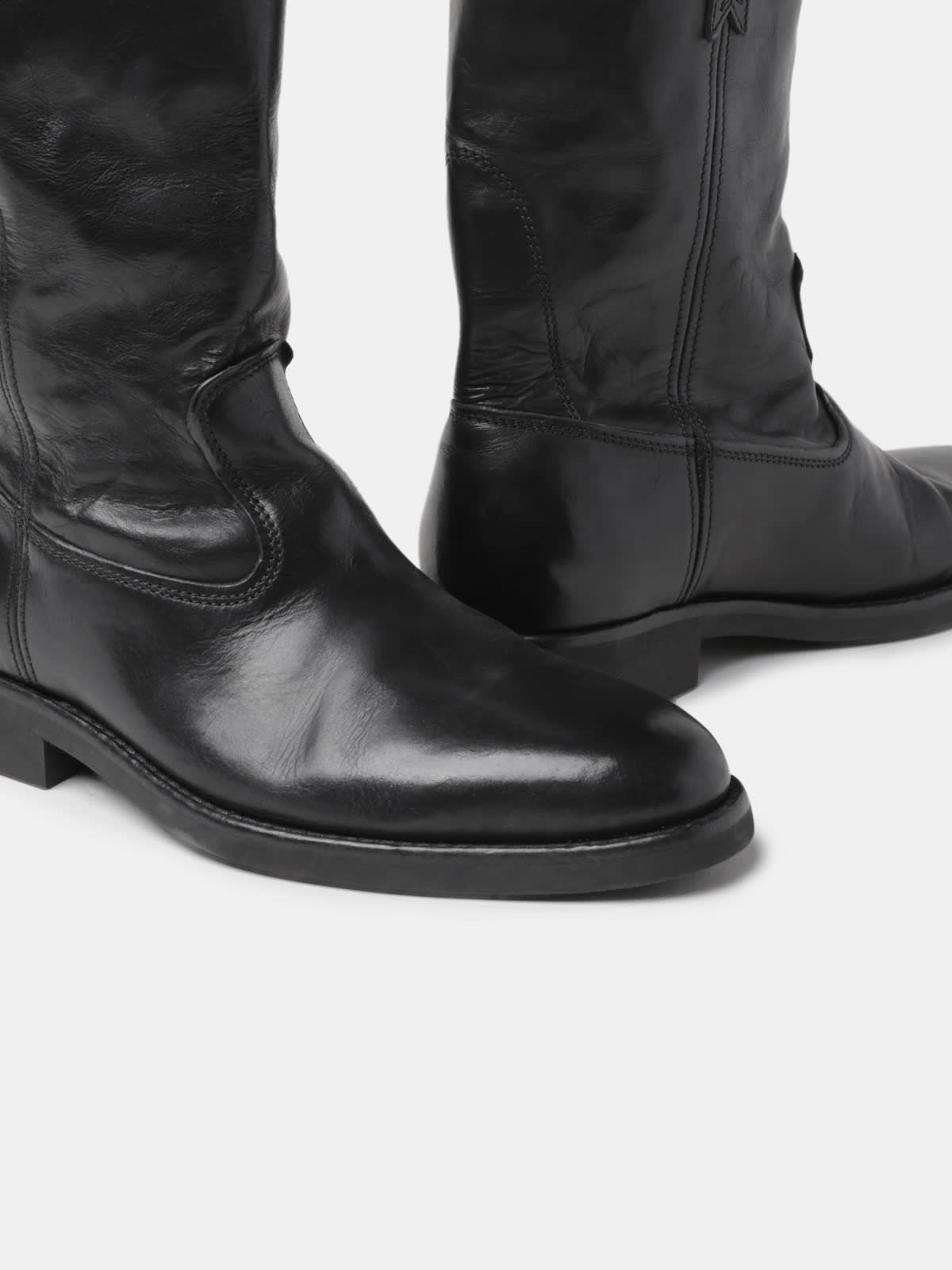 Biker boots in glossy black leather