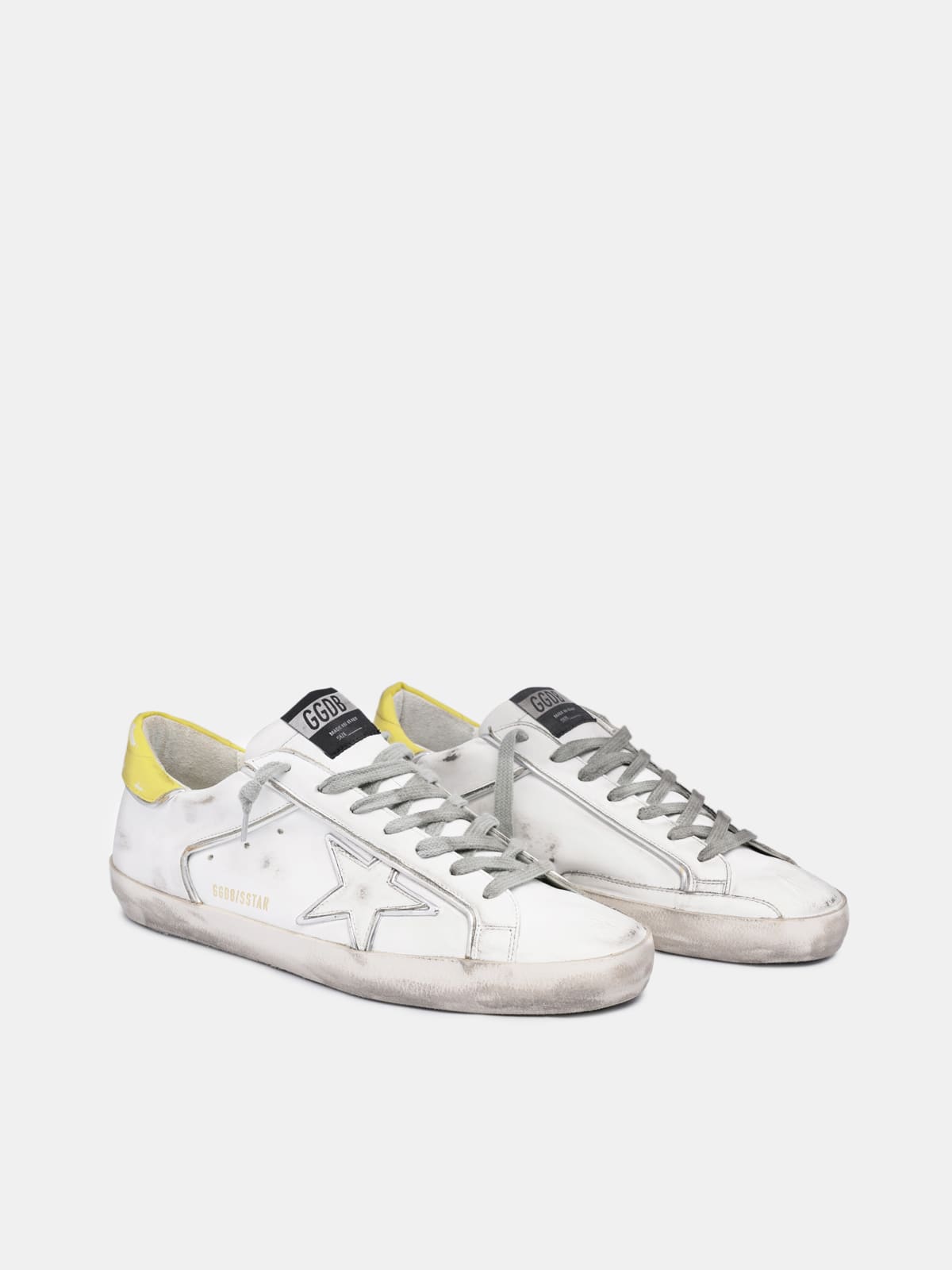 Golden goose white on sale & silver superstar sneakers