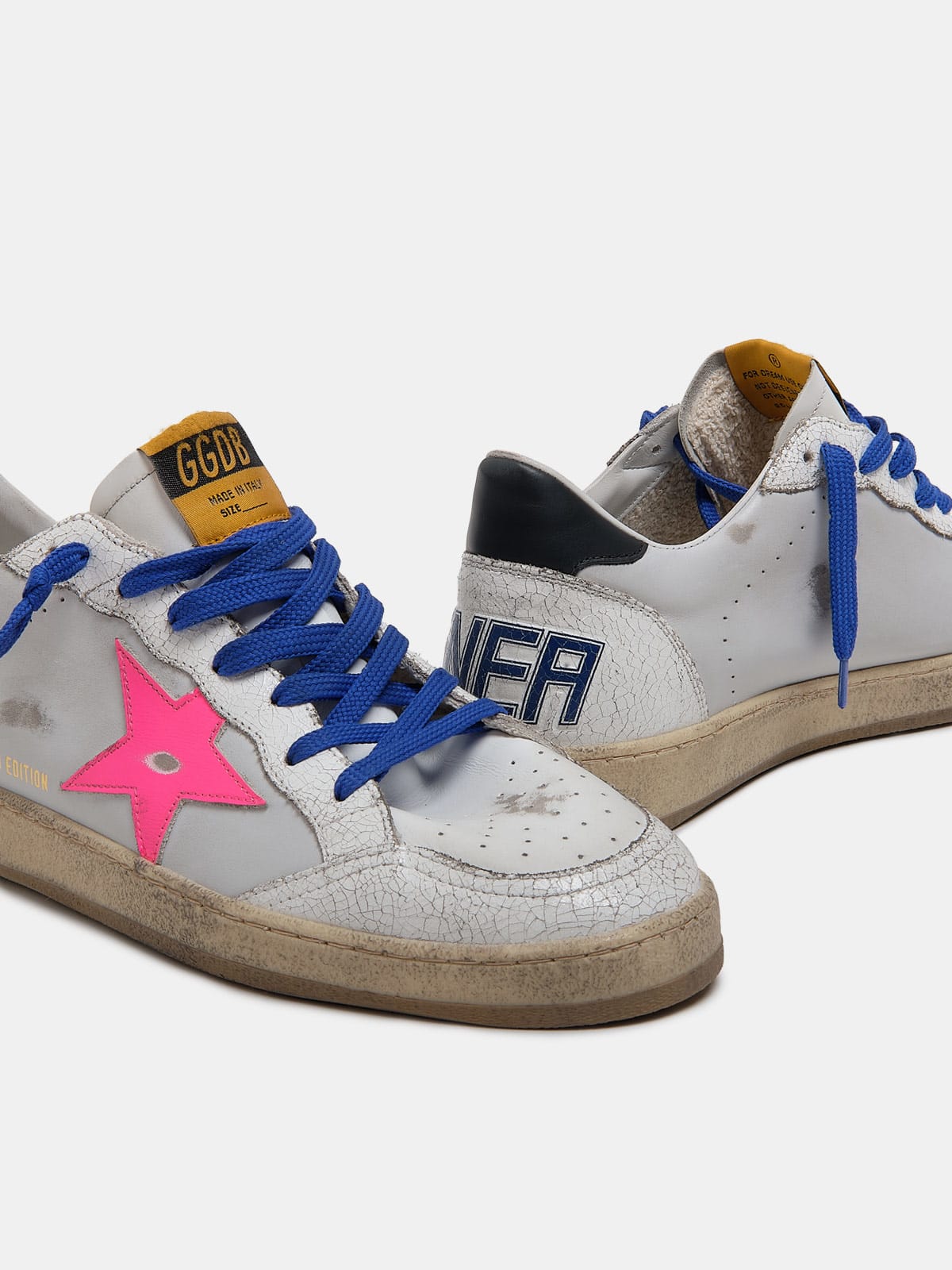 Men s LTD Ball Star sneakers with cracked leather inserts fluorescent fuchsia star and blue laces