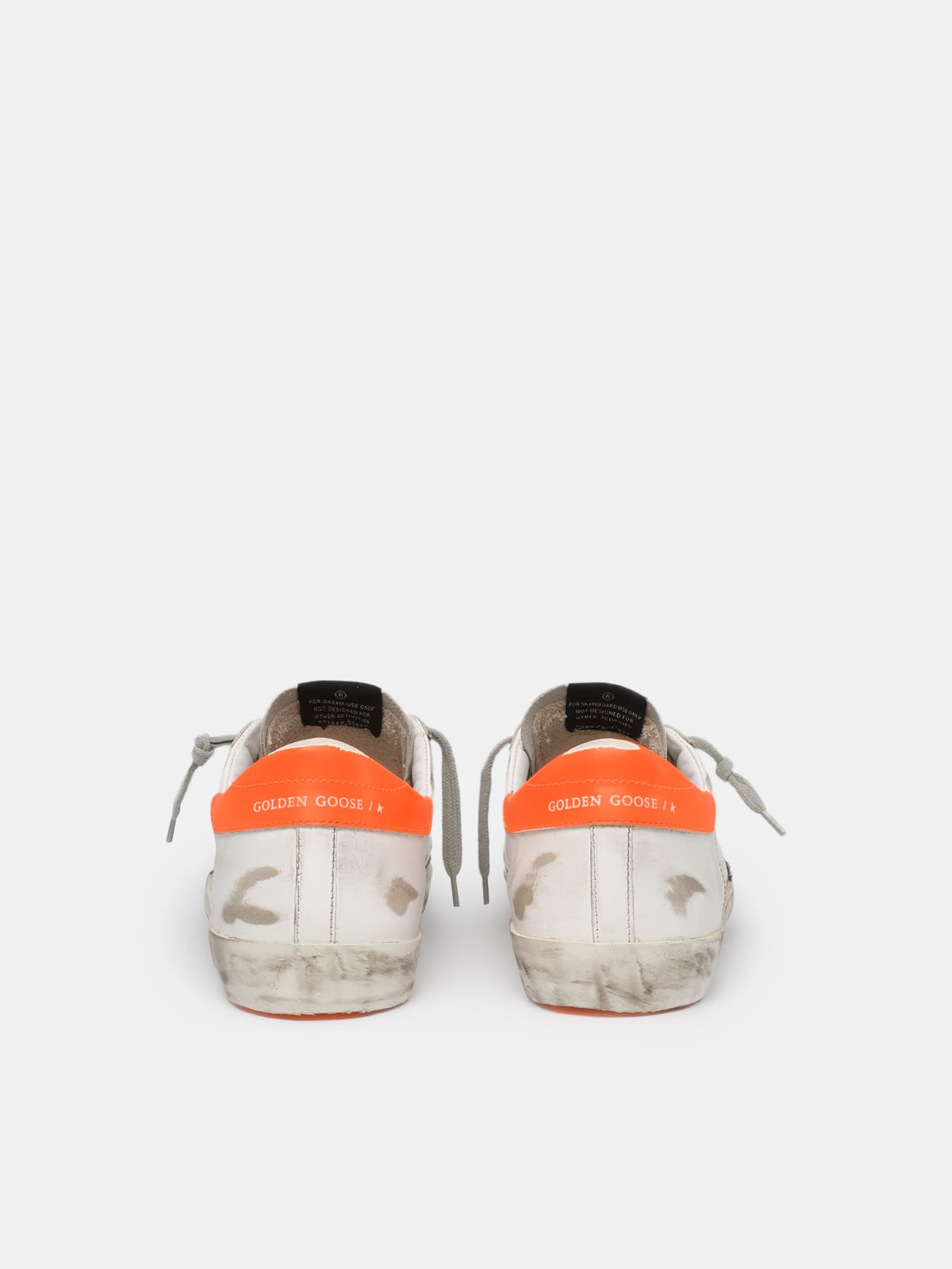 Men s Super Star sneakers with orange heel tab