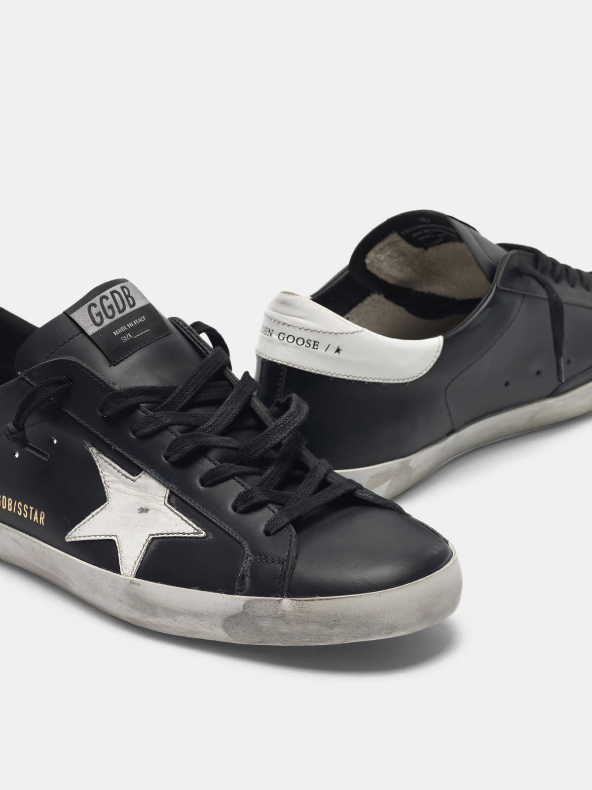 Golden goose black and best sale white superstar