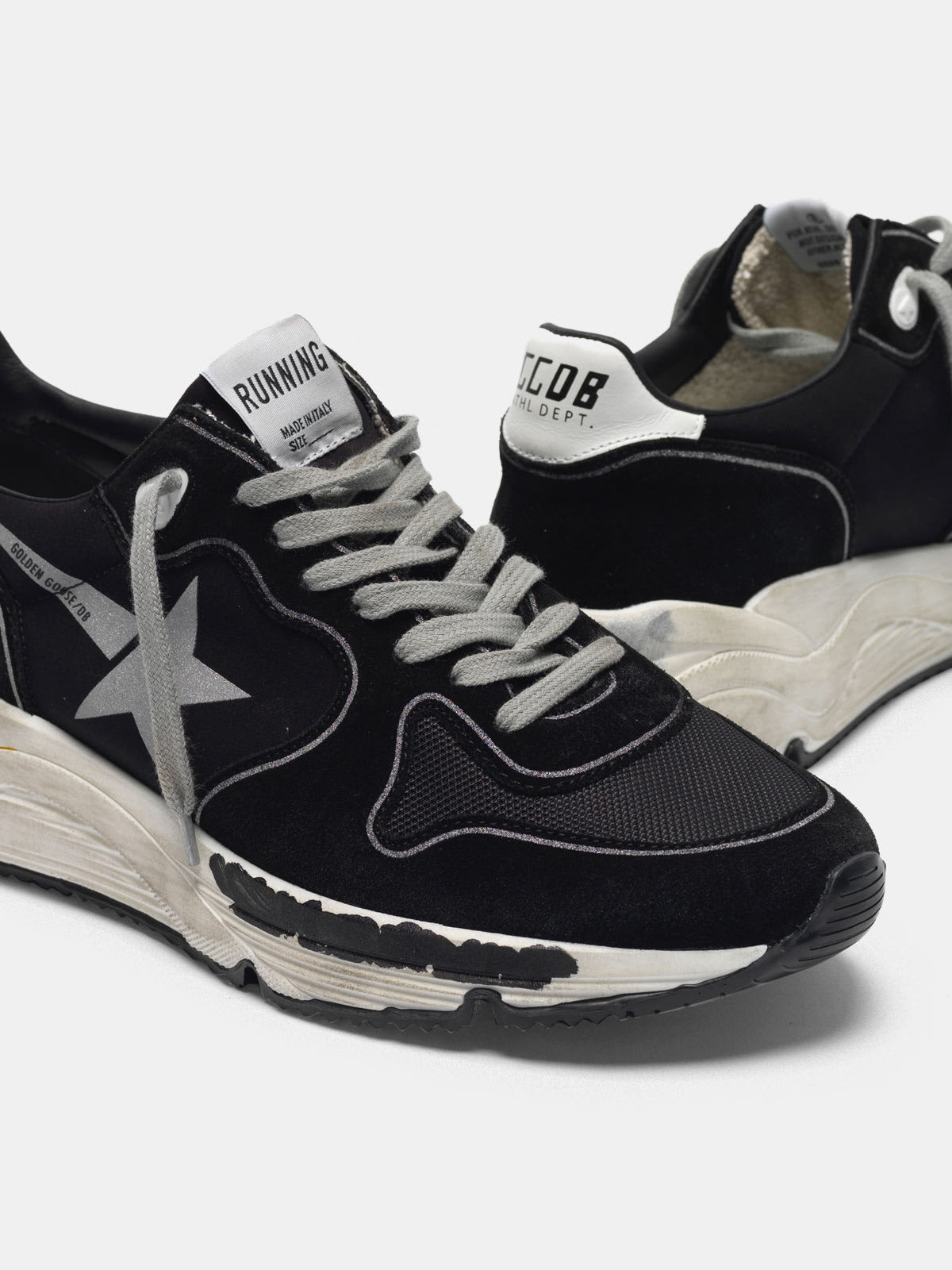Black Running Sole sneakers with silver star | Golden Goose