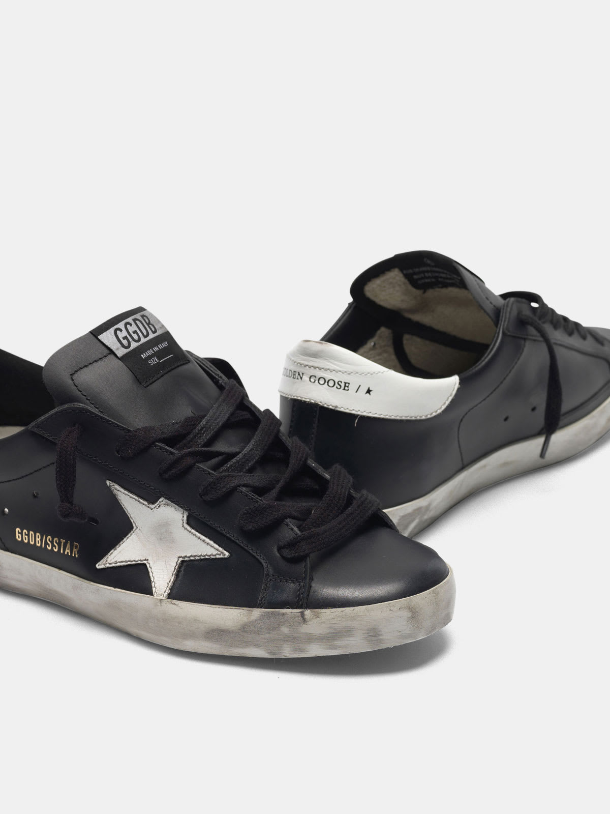 Golden goose superstar on sale black and white