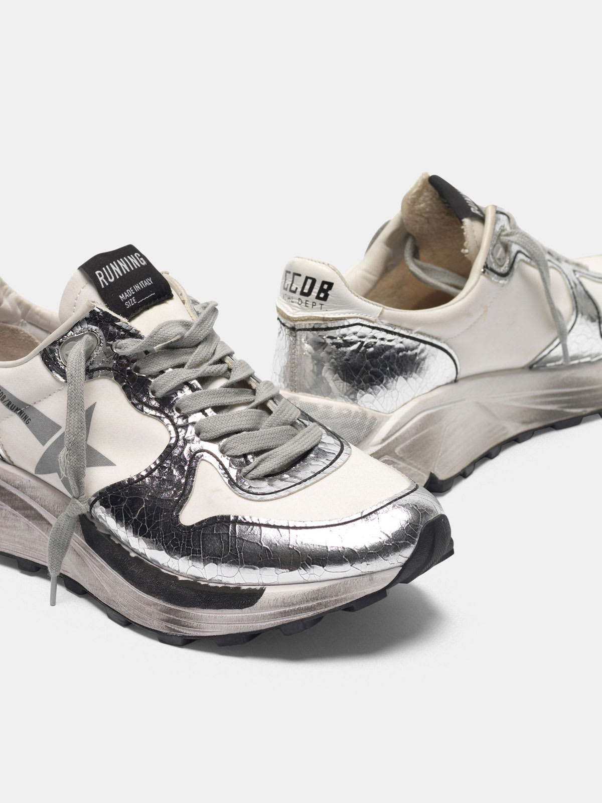 Silver and white Running Sole sneakers