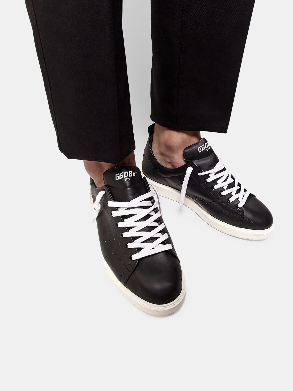 Starter sneakers in leather with printed star on the heel tab | Golden Goose