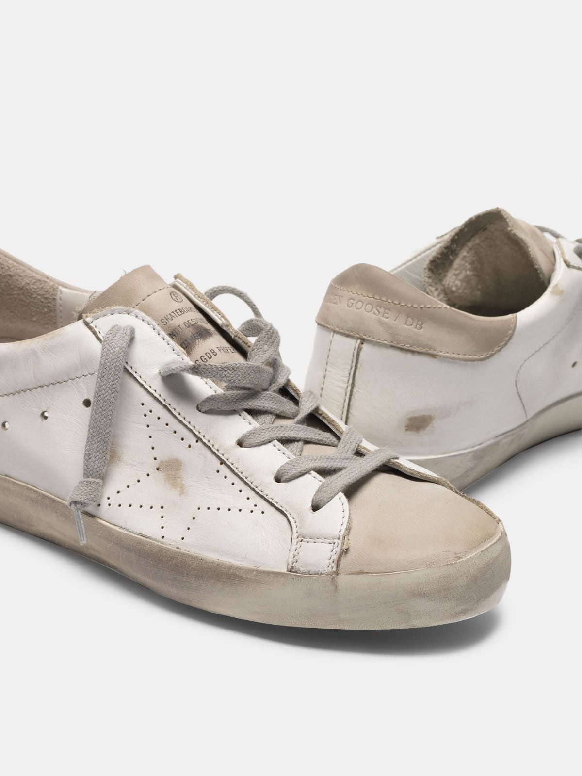 Sneakers super star in pelle e store stella traforata