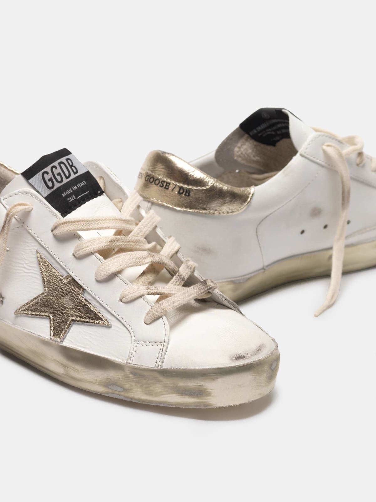 Super-Star sneakers with gold sparkle foxing and metal stud lettering |  Golden Goose