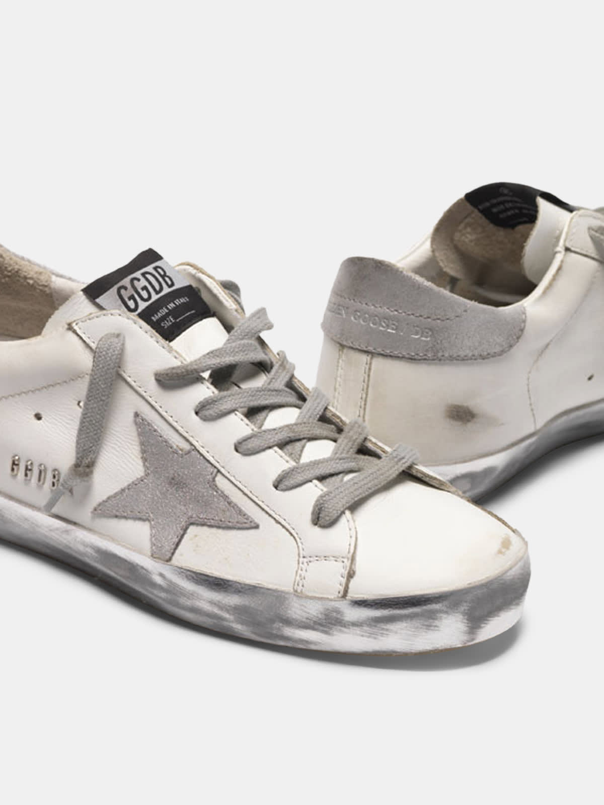 Super-Star sneakers with silver sparkle foxing and metal stud lettering |  Golden Goose