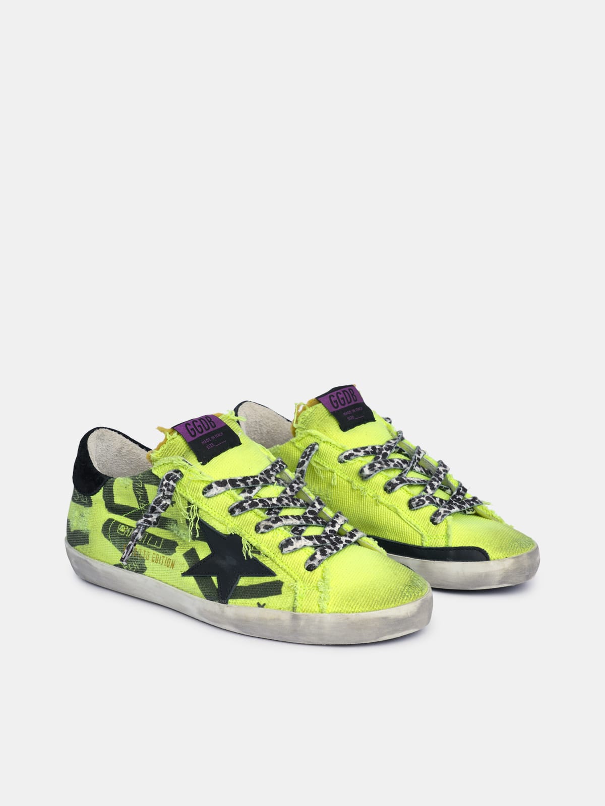 Super Star sneakers in fluorescent yellow cotton with contrasting black decorations