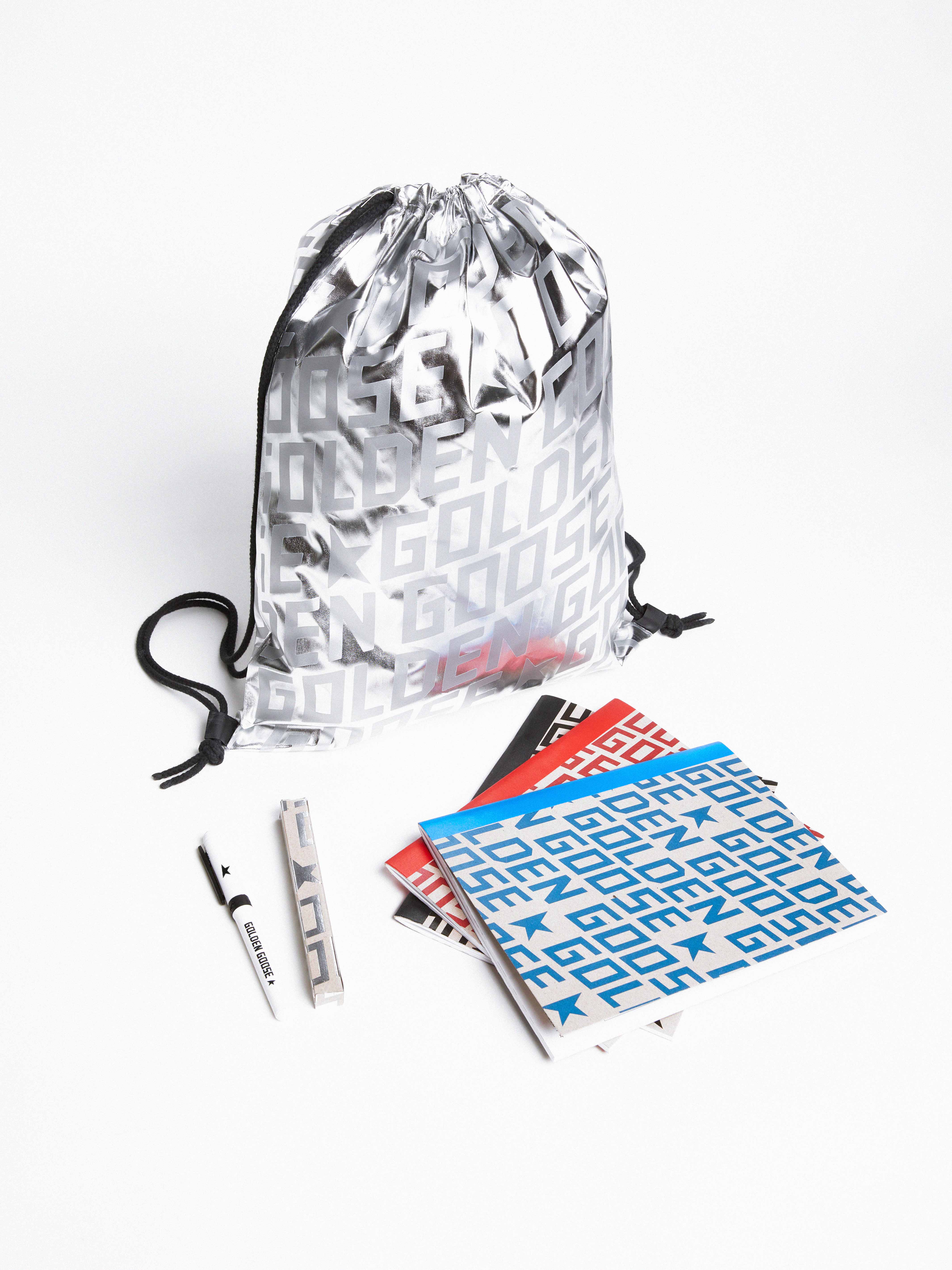 Silver backpack with Golden Goose logo, black marker and colorful notepad  (free gift)