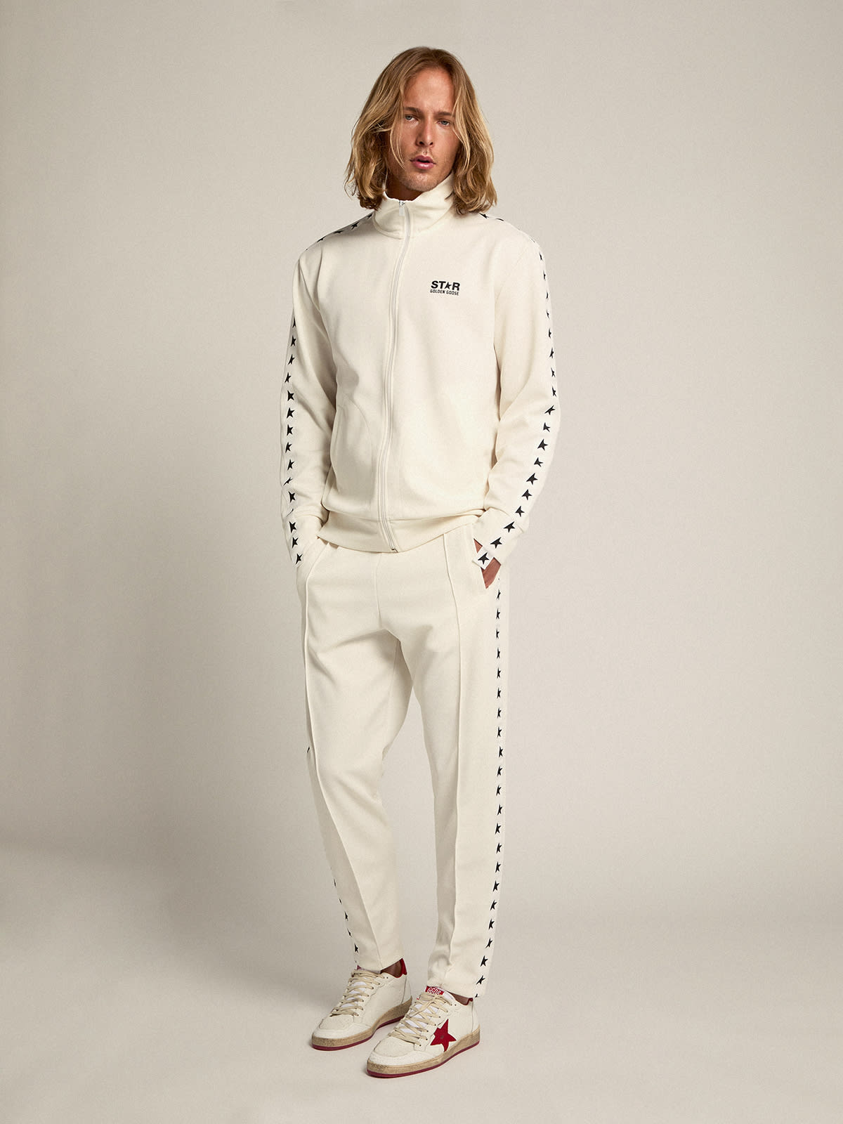 Men’s white zipped sweatshirt with white strip and black stars