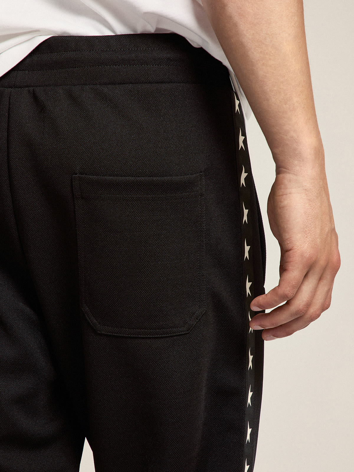 Pantalon de jogging homme noir avec étoile sur le devant