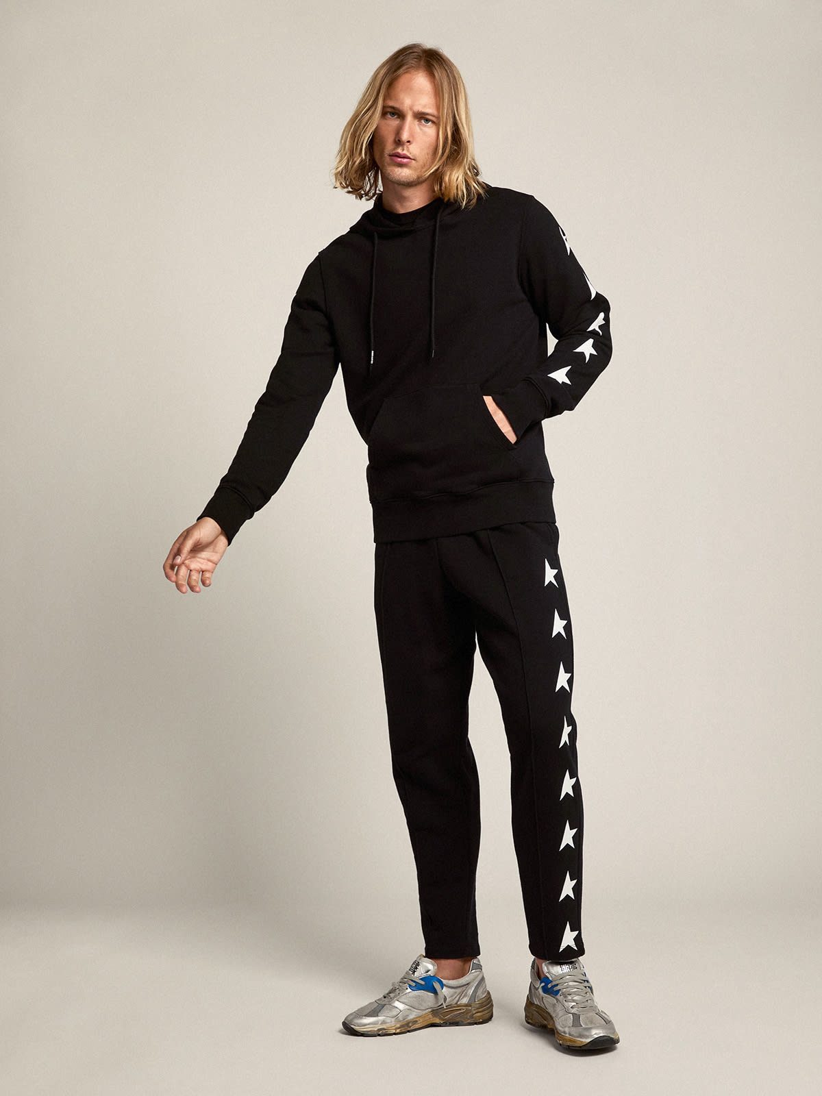 Men's black joggers with white stars