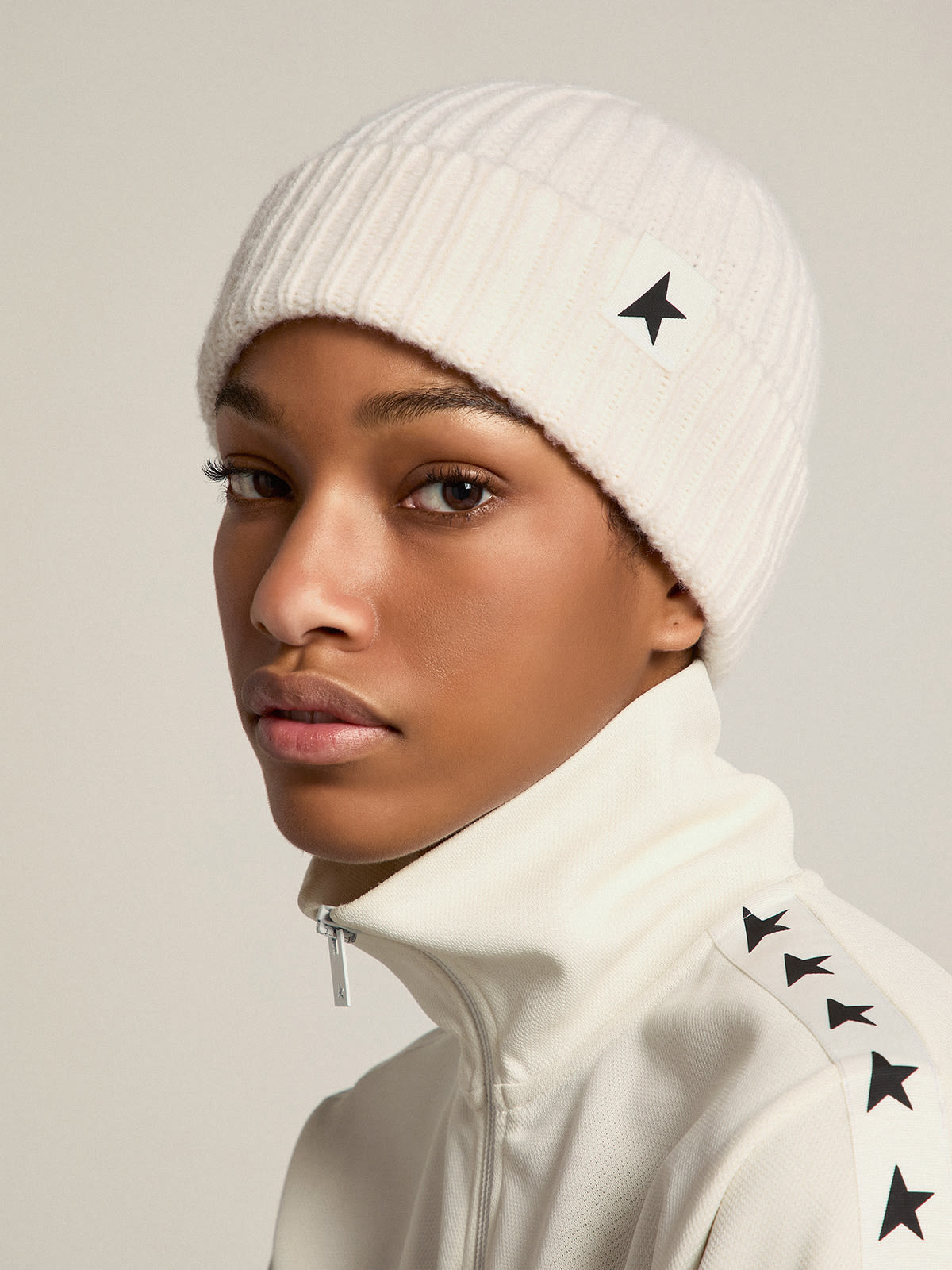 White wool beanie with black star