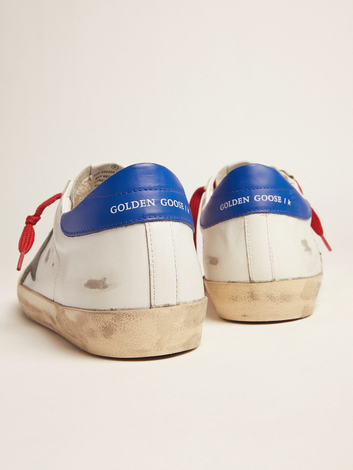 Golden goose red store and blue