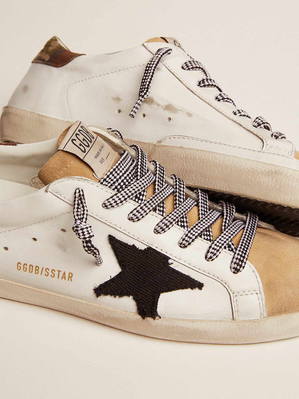 Super-Star LTD sneakers in white leather with camouflage heel tab and black  star