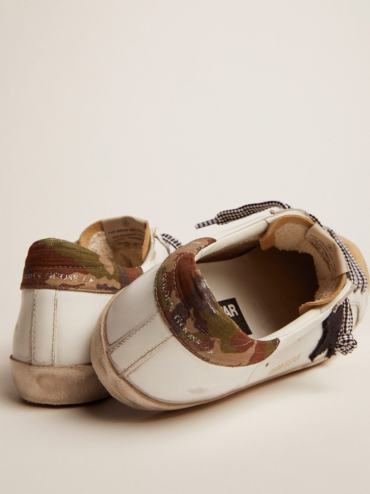 Super Star LTD sneakers in white leather with camouflage heel tab and black star