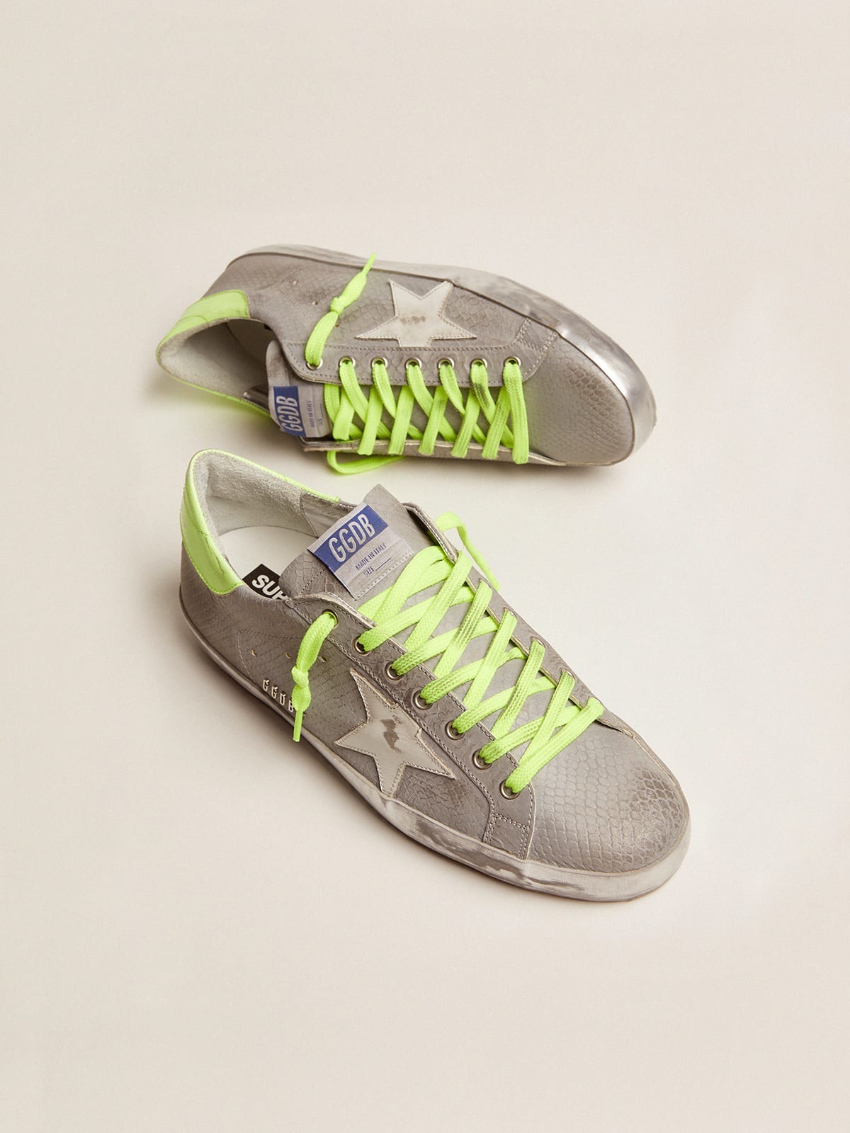 Golden Goose - Super-Star sneakers in silver snake-print leather with fluorescent leather heel tab in 
