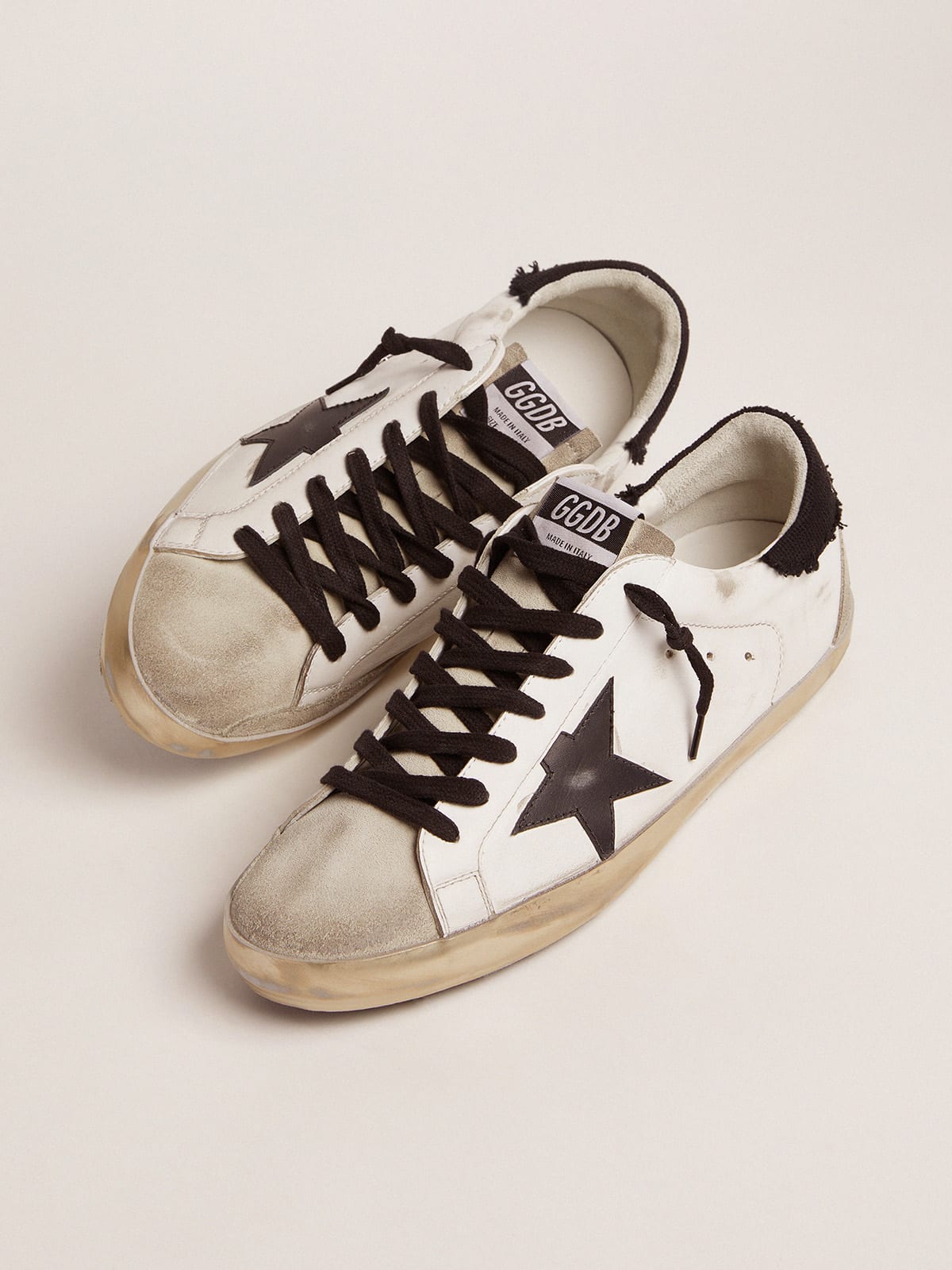 Golden goose distressed shop superstar sneakers black