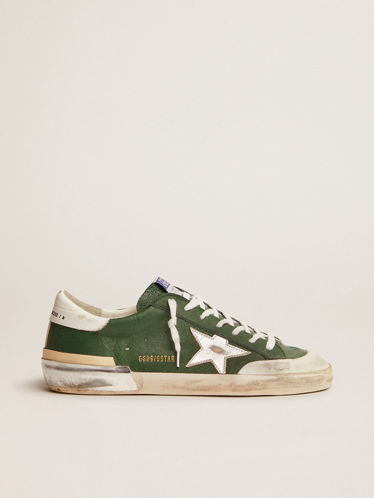 Super-Star sneakers in green leather and multi-foxing