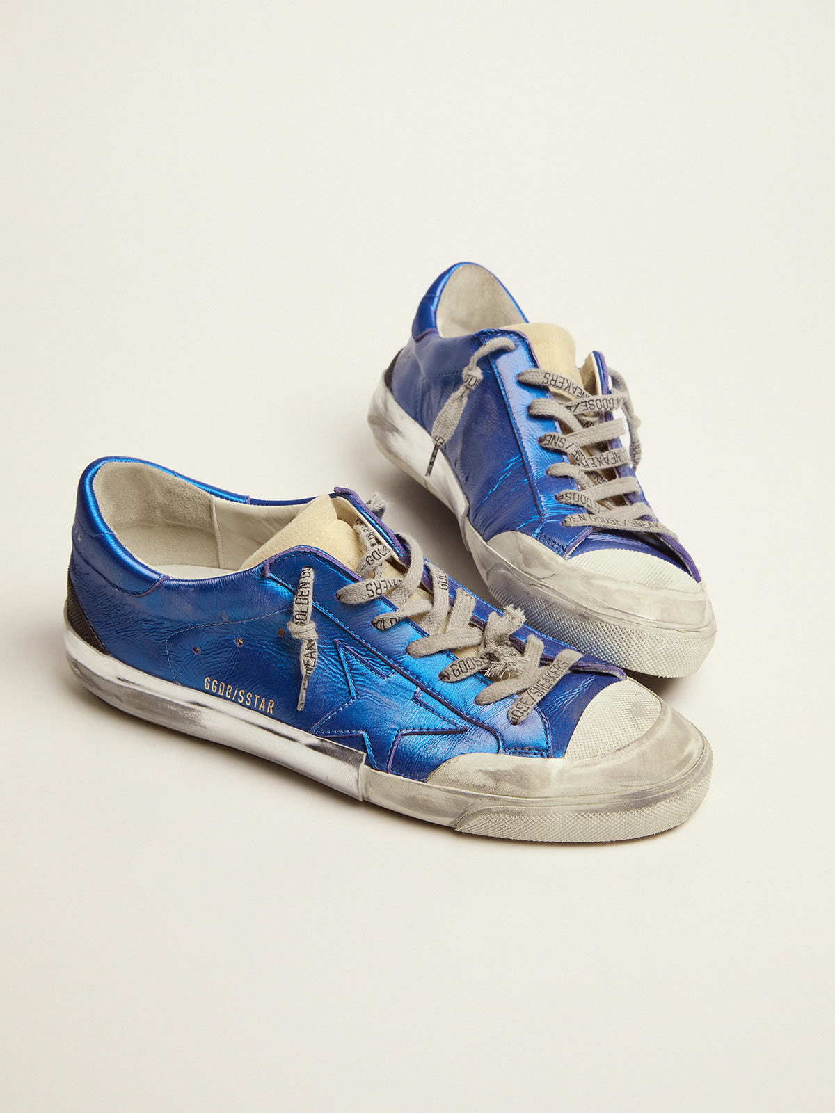 SuperStar Penstar sneakers in blue laminated leather with multifoxing