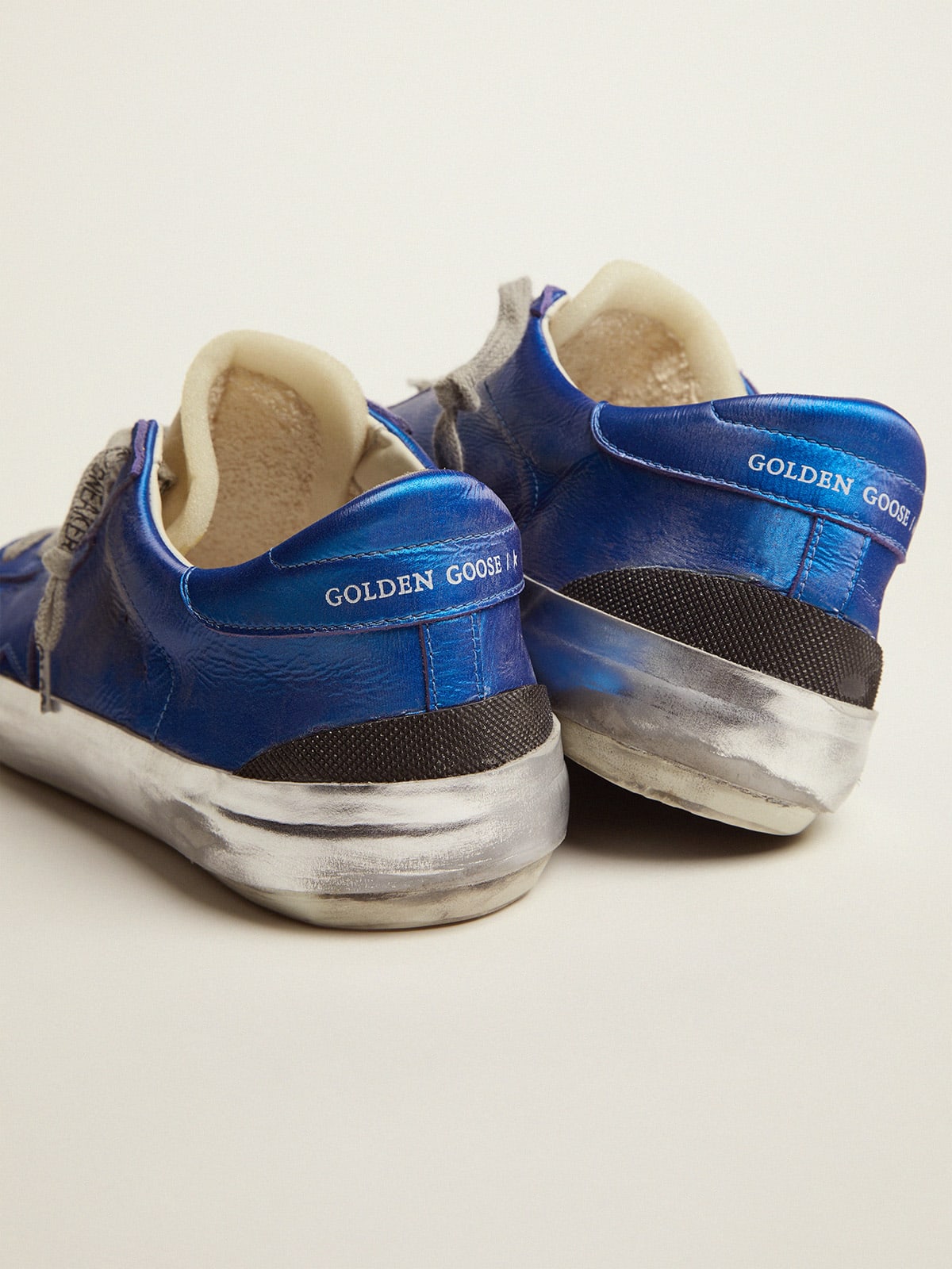 Super-Star Penstar sneakers in blue laminated leather with multi-foxing |  Golden Goose