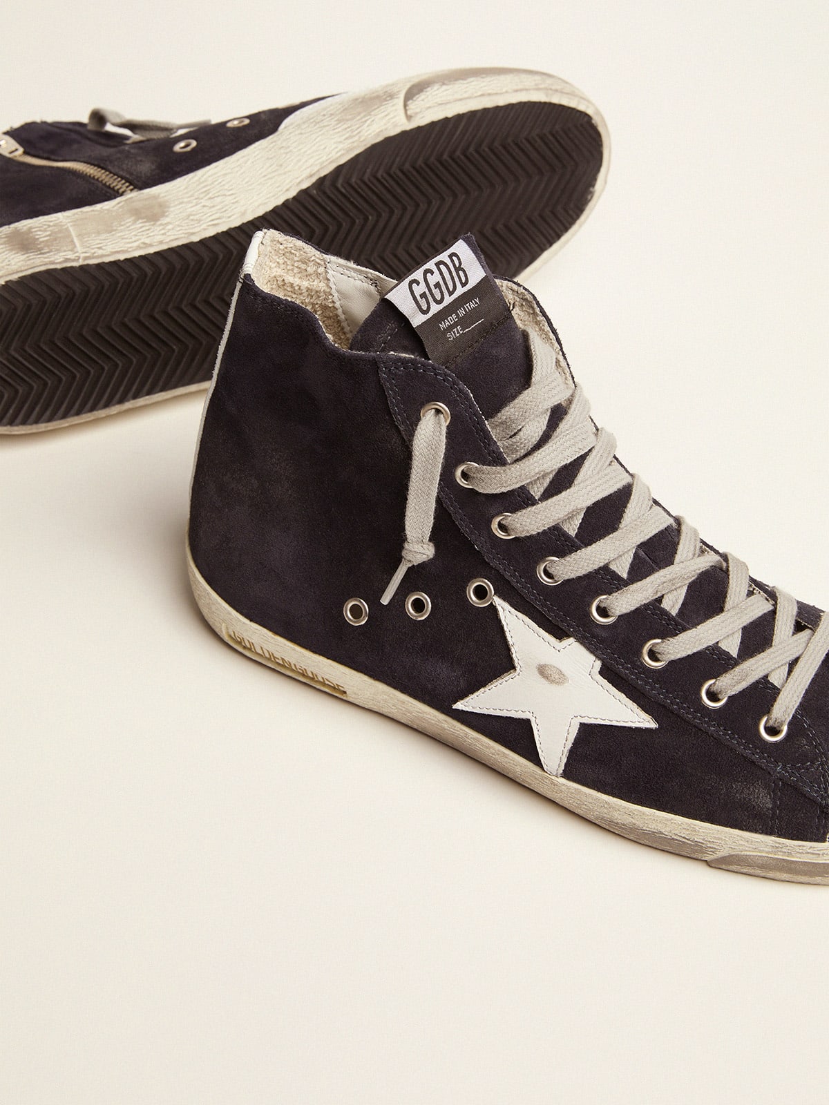 Francy sneakers in leather with leather star and heel tab | Golden