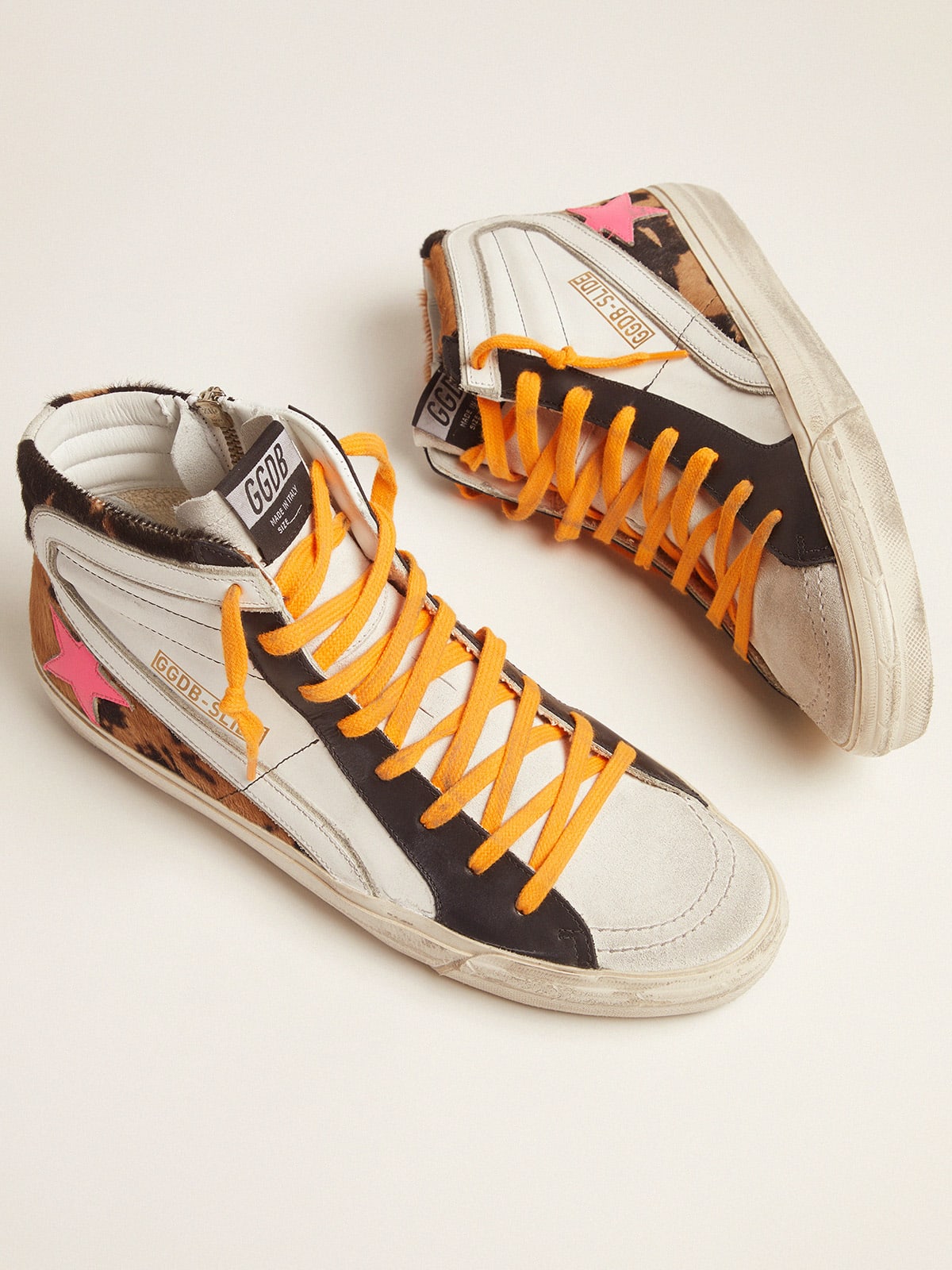 Slide sneakers in pony skin with orange laces and a fuchsia star | Golden  Goose