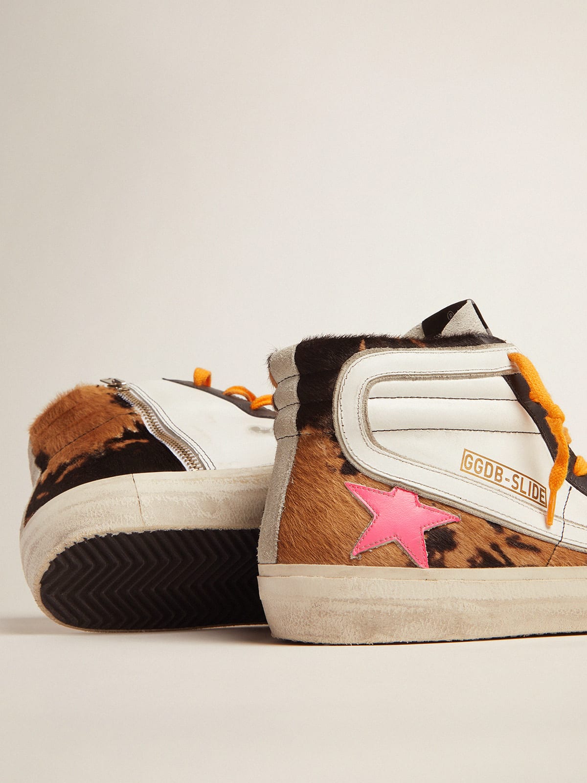 Slide sneakers in pony skin with orange laces and a fuchsia star | Golden  Goose