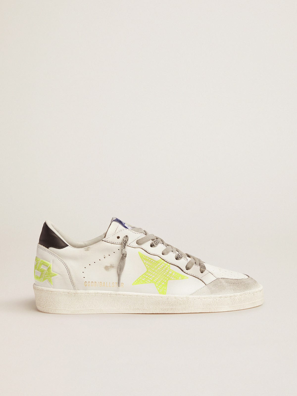 White Ball Star sneakers with fluorescent yellow details | Golden Goose