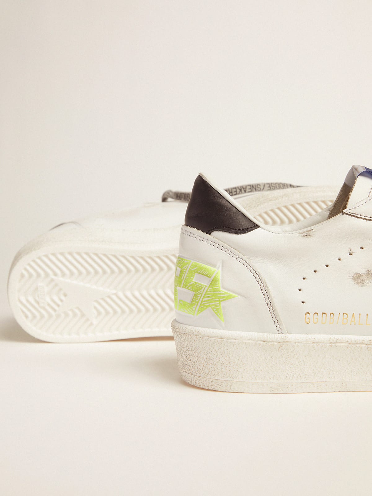 White Ball Star sneakers with fluorescent yellow details | Golden Goose
