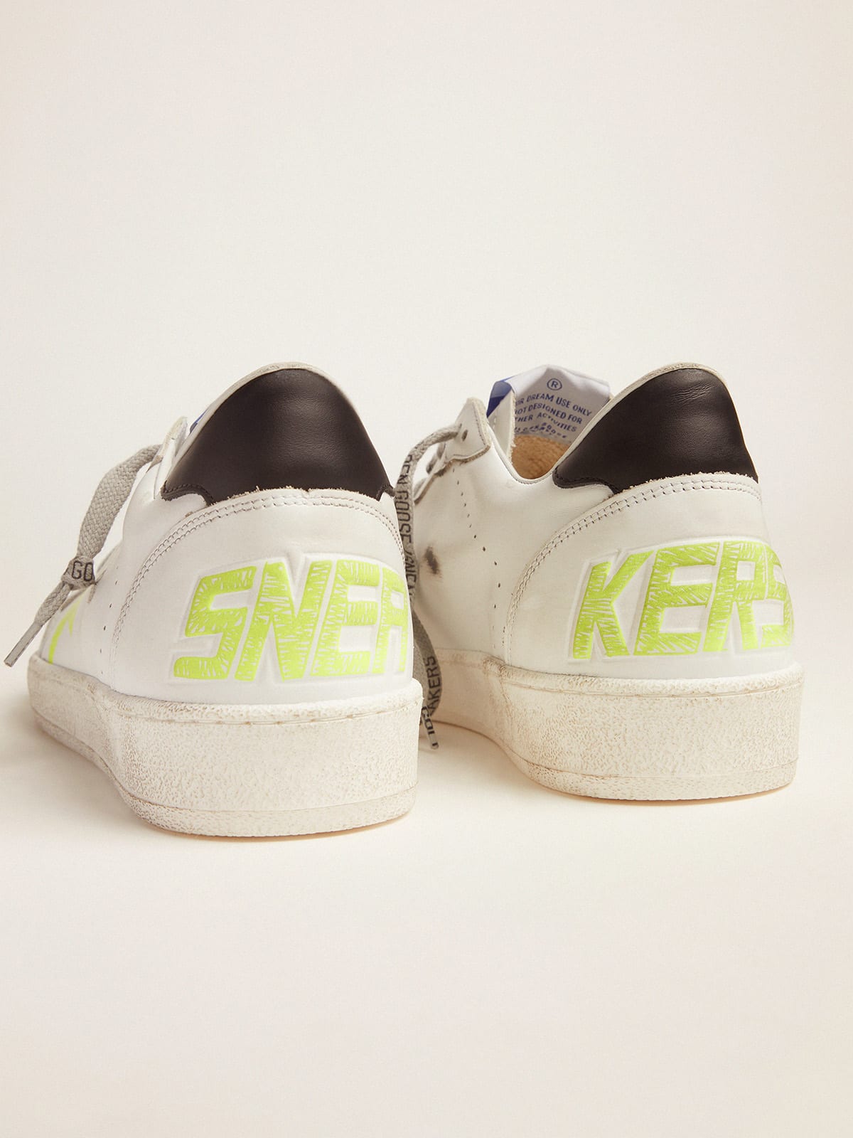 White Ball Star sneakers with fluorescent yellow details | Golden Goose