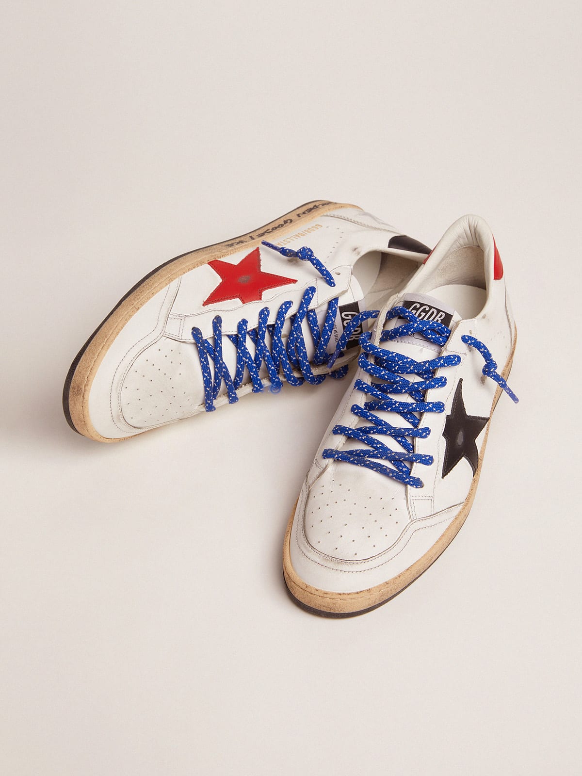 Golden Goose - Ball Star sneakers in white leather with signature on the foxing and red star in 