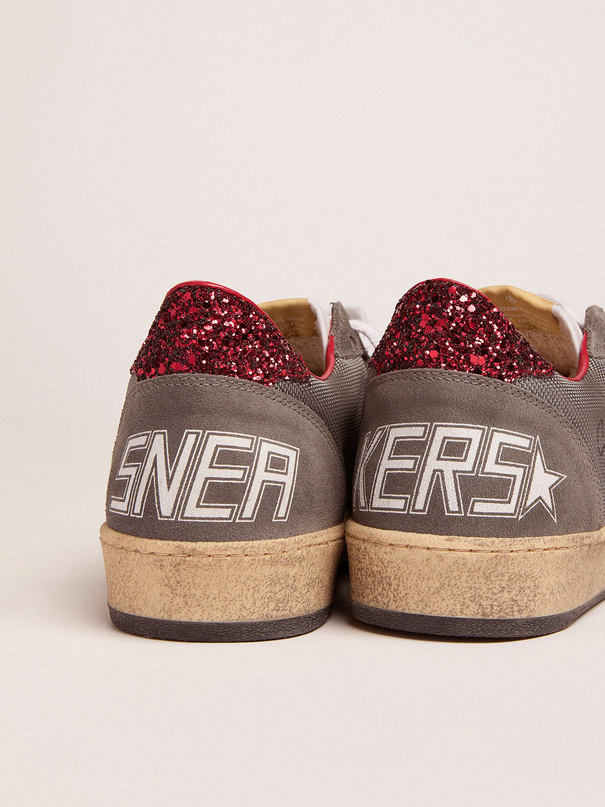 Ball Star sneakers in pale silver mesh with red glitter heel tab